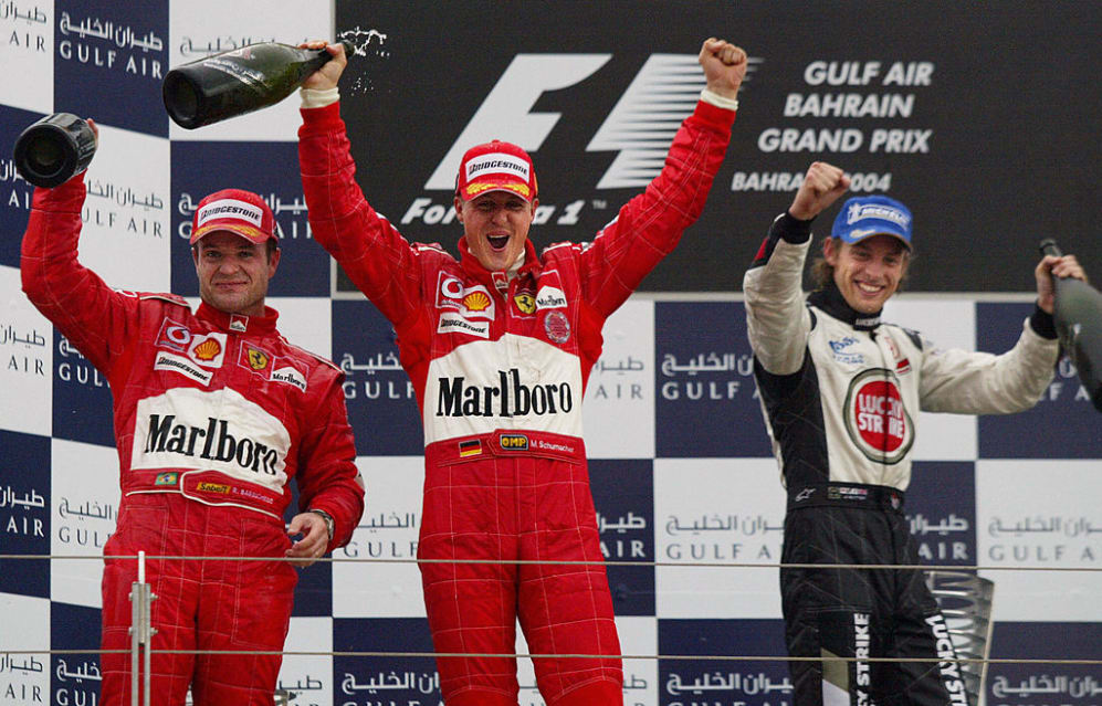 SAKHIR, Bahrain:  German Ferrari driver Michael Schumacher (C), his Brazilian teammate Rubens