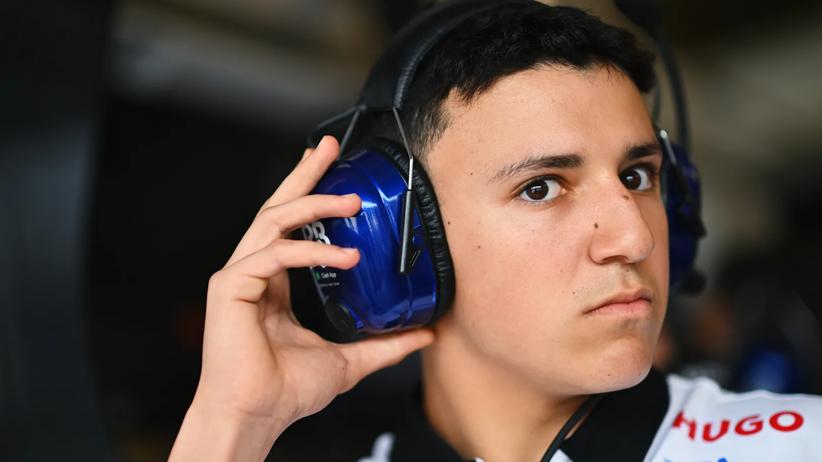 AUSTIN, TEXAS - OCTOBER 18: Isack Hadjar of France and reserve driver for Visa Cash App RB looks on