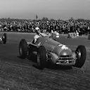 Giuseppe Farina leads Alfa Romeo team mate Luigi Fagioli around the Silverstone circuit