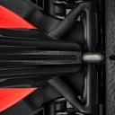 Indoor studio shot, exterior, bird’s-eye view, detail of rear section and rear wing