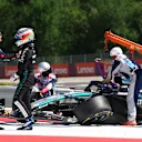 SPIELBERG, AUSTRIA - JUNE 29: Max Verstappen of the Netherlands and Oracle Red Bull Racing and Andrea Kimi Antonelli of Italy and Mercedes AMG Petronas F1 Team talk after a crash during the F1 Grand Prix of Austria at Red Bull Ring on June 29, 2025 in Spielberg, Austria. (Photo by Andy Hone/LAT Images)
