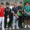SHANGHAI, CHINA - MARCH 23: Drivers and team personnel gather for a tribute to the late Eddie