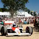 Four-time F1 World Champion Alain Prost drives the McLaren MP4/4 chassis that he drove to victory at the 1988 Monaco Grand Prix