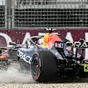 Red Bull Racing's Dutch driver Max Verstappen crashes during the qualifying session of the Formula One Australian Grand Prix at the Albert Park Circuit in Melbourne on March 7, 2026. (Photo by Paul Crock / AFP via Getty Images) / -- IMAGE RESTRICTED TO EDITORIAL USE - STRICTLY NO COMMERCIAL USE --