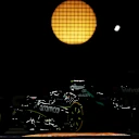 SINGAPORE, SINGAPORE - OCTOBER 05: Fernando Alonso of Spain driving the (14) Aston Martin F1 Team AMR25 Mercedes on track during the F1 Grand Prix of Singapore at Marina Bay Street Circuit on October 05, 2025 in Singapore, Singapore. (Photo by Clive Rose - Formula 1/Formula 1 via Getty Images)