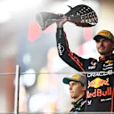 ABU DHABI, UNITED ARAB EMIRATES - DECEMBER 07: Race winner Max Verstappen of the Netherlands and Oracle Red Bull Racing celebrates on the podium during the F1 Grand Prix of Abu Dhabi at Yas Marina Circuit on December 07, 2025 in Abu Dhabi, United Arab Emirates. (Photo by James Sutton - Formula 1/Formula 1 via Getty Images)