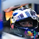 ABU DHABI, UNITED ARAB EMIRATES - DECEMBER 06: Isack Hadjar of France and Visa Cash App Racing Bulls prepares to drive in the garage during qualifying ahead of the F1 Grand Prix of Abu Dhabi at Yas Marina Circuit on December 06, 2025 in Abu Dhabi, United Arab Emirates. (Photo by Rudy Carezzevoli/Getty Images)