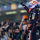 ABU DHABI, UNITED ARAB EMIRATES - DECEMBER 06: Max Verstappen of Oracle Red Bull Racing and The Netherlands celebrates pole position during qualifying ahead of the F1 Grand Prix of Abu Dhabi at Yas Marina Circuit on December 06, 2025 in Abu Dhabi, United Arab Emirates. (Photo by Peter Fox/Getty Images)