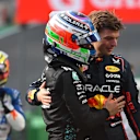 SAO PAULO, BRAZIL - NOVEMBER 07: Sprint 2nd qualifier Andrea Kimi Antonelli of Italy and Mercedes AMG Petronas F1 Team is congratulated by Max Verstappen of the Netherlands and Oracle Red Bull Racing in parc ferme during Sprint Qualifying ahead of the F1 Grand Prix of Brazil at Autodromo Jose Carlos Pace on November 07, 2025 in Sao Paulo, Brazil. (Photo by Rudy Carezzevoli/Getty Images)
