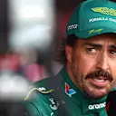BUDAPEST, HUNGARY - AUGUST 01: Fernando Alonso of Spain and Aston Martin F1 Team is interviewed during practice ahead of the F1 Grand Prix of Hungary at Hungaroring on August 01, 2025 in Budapest, Hungary. (Photo by Bryn Lennon - Formula 1/Formula 1 via Getty Images)