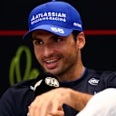LUSAIL CITY, QATAR - NOVEMBER 27: Carlos Sainz of Spain and Williams speaks in the Drivers Press Conference during previews ahead of the F1 Grand Prix of Qatar at Lusail International Circuit on November 27, 2025 in Lusail City, Qatar. (Photo by Clive Rose/Getty Images)