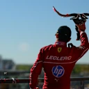 AUSTIN, TEXAS - OCTOBER 19: Third placed Charles Leclerc of Monaco and Scuderia Ferrari leaves the podium with his trophy during the F1 Grand Prix of United States at Circuit of The Americas on October 19, 2025 in Austin, Texas. (Photo by Mario Renzi - Formula 1/Formula 1 via Getty Images)