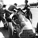 Alfa Romeo racer Juan Manuel Fangio makes a pit stop during the Grand Prix