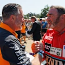 McLaren CEO Zak Brown and 1992 F1 World Champion Nigel Mansell greet each other at Goodwood