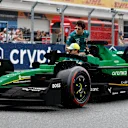MIAMI, FLORIDA - MAY 04: Fernando Alonso of Spain and Aston Martin F1 Team and Lance Stroll of