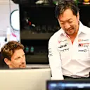 SCARPERIA, ITALY - SEPTEMBER 26: Romain Grosjean of France talks with Ayao Komatsu, Team Principal