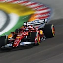 SINGAPORE, SINGAPORE - OCTOBER 05: Charles Leclerc of Monaco driving the (16) Scuderia Ferrari SF-25 on track during to the F1 Grand Prix of Singapore at Marina Bay Street Circuit on October 05, 2025 in Singapore, Singapore. (Photo by Mark Thompson/Getty Images)