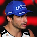 SINGAPORE, SINGAPORE - OCTOBER 05: Tenth placed Carlos Sainz of Spain and Williams talks to the media during the F1 Grand Prix of Singapore at Marina Bay Street Circuit on October 05, 2025 in Singapore, Singapore. (Photo by Bryn Lennon/Getty Images)