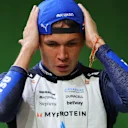 SINGAPORE, SINGAPORE - OCTOBER 04: Twelfth placed qualifier Alexander Albon of Thailand and Williams looks on during qualifying ahead of the F1 Grand Prix of Singapore at Marina Bay Street Circuit on October 04, 2025 in Singapore, Singapore. (Photo by Clive Rose - Formula 1/Formula 1 via Getty Images)