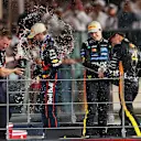 After listening to his national anthem, Norris unleashed the champagne