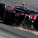 SPIELBERG, AUSTRIA - JUNE 28: Sparks fly behind Lewis Hamilton of Great Britain driving the (44) Scuderia Ferrari SF-25 on track during qualifying ahead of the F1 Grand Prix of Austria at Red Bull Ring on June 28, 2025 in Spielberg, Austria. (Photo by Clive Rose - Formula 1/Formula 1 via Getty Images)