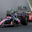 SPA, BELGIUM - JULY 27: Franco Colapinto of Argentina driving the (43) Alpine F1 A525 Renault leads Lewis Hamilton of Great Britain driving the (44) Scuderia Ferrari SF-25 on track during the F1 Grand Prix of Belgium at Circuit de Spa-Francorchamps on July 27, 2025 in Spa, Belgium. (Photo by Mark Thompson/Getty Images)