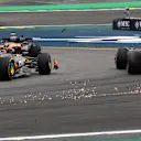 SAO PAULO, BRAZIL - NOVEMBER 09: Lando Norris of Great Britain driving the (4) McLaren MCL39 Mercedes, Andrea Kimi Antonelli of Italy driving the (12) Mercedes AMG Petronas F1 Team W16 and Oscar Piastri of Australia driving the (81) McLaren MCL39 Mercedes battle for track position during the F1 Grand Prix of Brazil at Autodromo Jose Carlos Pace on November 09, 2025 in Sao Paulo, Brazil. (Photo by Mark Thompson/Getty Images)