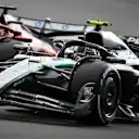 NORTHAMPTON, ENGLAND - JULY 06: Andrea Kimi Antonelli of Italy driving the (12) Mercedes AMG Petronas F1 Team W16 leads Charles Leclerc of Monaco driving the (16) Scuderia Ferrari SF-25 on track during the F1 Grand Prix of Great Britain at Silverstone Circuit on July 06, 2025 in Northampton, England. (Photo by James Sutton - Formula 1/Formula 1 via Getty Images)