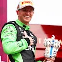NORTHAMPTON, ENGLAND - JULY 06: Third placed Nico Hulkenberg of Germany and Stake F1 Team Kick Sauber celebrates on the podium during the F1 Grand Prix of Great Britain at Silverstone Circuit on July 06, 2025 in Northampton, England. (Photo by Bryn Lennon - Formula 1/Formula 1 via Getty Images)
