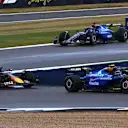 NORTHAMPTON, ENGLAND - JULY 06: Carlos Sainz of Spain driving the (55) Williams FW47 Mercedes leads Max Verstappen of the Netherlands driving the (1) Oracle Red Bull Racing RB21 and Alexander Albon of Thailand driving the (23) Williams FW47 Mercedes on track during the F1 Grand Prix of Great Britain at Silverstone Circuit on July 06, 2025 in Northampton, England. (Photo by Mark Sutton - Formula 1/Formula 1 via Getty Images)