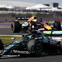 NORTHAMPTON, ENGLAND - JULY 04: Lance Stroll of Canada driving the (18) Aston Martin F1 Team AMR25 Mercedes leads Yuki Tsunoda of Japan driving the (22) Oracle Red Bull Racing RB21 on track during practice ahead of the F1 Grand Prix of Great Britain at Silverstone Circuit on July 04, 2025 in Northampton, England. (Photo by Mark Sutton - Formula 1/Formula 1 via Getty Images)