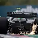 BUDAPEST, HUNGARY - AUGUST 01: Sparks fly behind Gabriel Bortoleto of Brazil driving the (5) Kick Sauber C45 Ferrari on track during practice ahead of the F1 Grand Prix of Hungary at Hungaroring on August 01, 2025 in Budapest, Hungary. (Photo by Mark Thompson/Getty Images)