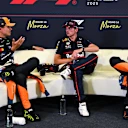 MONZA, ITALY - SEPTEMBER 06: Pole position qualifier Max Verstappen of the Netherlands and Oracle Red Bull Racing Second placed qualifier Lando Norris of Great Britain and McLaren and Third placed qualifier Oscar Piastri of Australia and McLaren talk in the Drivers Press Conference during qualifying ahead of the F1 Grand Prix of Italy at Autodromo Nazionale Monza on September 06, 2025 in Monza, Italy. (Photo by Mark Sutton/Getty Images)