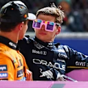LAS VEGAS, NEVADA - NOVEMBER 22: Race winner Max Verstappen of the Netherlands and Oracle Red Bull Racing and Second placed Lando Norris of Great Britain and McLaren in a Lego pink Cadillac in parc ferme during the F1 Grand Prix of Las Vegas at Las Vegas Strip Circuit on November 22, 2025 in Las Vegas, Nevada. (Photo by Mark Thompson/Getty Images)