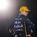 LAS VEGAS, NEVADA - NOVEMBER 22: Race winner Max Verstappen of the Netherlands and Oracle Red Bull Racing on the podium during the F1 Grand Prix of Las Vegas at Las Vegas Strip Circuit on November 22, 2025 in Las Vegas, Nevada. (Photo by Alex Bierens de Haan/Getty Images)