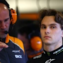 LAS VEGAS, NEVADA - NOVEMBER 20: Oscar Piastri of Australia and McLaren talks in the garage during practice ahead of the F1 Grand Prix of Las Vegas at Las Vegas Strip Circuit on November 20, 2025 in Las Vegas, Nevada. (Photo by Bryn Lennon - Formula 1/Formula 1 via Getty Images)