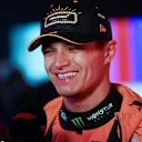 LAS VEGAS, NEVADA - NOVEMBER 21: Pole position qualifier Lando Norris of Great Britain and McLaren is interviewed during qualifying ahead of the F1 Grand Prix of Las Vegas at Las Vegas Strip Circuit on November 21, 2025 in Las Vegas, Nevada. (Photo by Peter Fox/Getty Images)