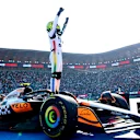 MEXICO CITY, MEXICO - OCTOBER 26: Race winner Lando Norris of Great Britain and McLaren celebrates on arrival in parc ferme during the F1 Grand Prix of Mexico at Autodromo Hermanos Rodriguez on October 26, 2025 in Mexico City, Mexico. (Photo by Bryn Lennon - Formula 1/Formula 1 via Getty Images)