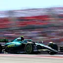 AUSTIN, TEXAS - OCTOBER 19: Fernando Alonso of Spain driving the (14) Aston Martin F1 Team AMR25 Mercedes heads to the grid prior to the F1 Grand Prix of United States at Circuit of The Americas on October 19, 2025 in Austin, Texas. (Photo by Clive Rose/Getty Images)