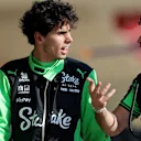 AUSTIN, TEXAS - OCTOBER 17: Gabriel Bortoleto of Brazil and Stake F1 Team Kick Sauber talks in the Pitlane during Sprint Qualifying ahead of the F1 Grand Prix of United States at Circuit of The Americas on October 17, 2025 in Austin, Texas. (Photo by Bryn Lennon - Formula 1/Formula 1 via Getty Images)