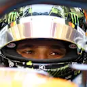 BAHRAIN, BAHRAIN - FEBRUARY 26: Lando Norris of Great Britain and McLaren looks on as he prepares
