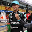 MELBOURNE, AUSTRALIA - MARCH 07: Pole position qualifier George Russell of Great Britain and Mercedes AMG Petronas F1 Team celebrates in parc ferme during qualifying ahead of the F1 Grand Prix of Australia at Albert Park Grand Prix Circuit on March 07, 2026 in Melbourne, Australia. (Photo by Anni Graf - Formula 1/Formula 1 via Getty Images)