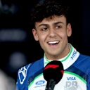 MELBOURNE, AUSTRALIA - MARCH 07: Ninth placed qualifier Arvid Lindblad of Great Britain and Visa Cash App Racing Bulls is interviewed during qualifying ahead of the F1 Grand Prix of Australia at Albert Park Grand Prix Circuit on March 07, 2026 in Melbourne, Australia. (Photo by Peter Fox/Getty Images)