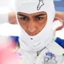 SHANGHAI, CHINA - MARCH 15: Arvid Lindblad of Great Britain and Visa Cash App Racing Bulls adjusts