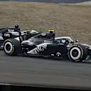 SHANGHAI, CHINA - MARCH 15: Valtteri Bottas of Finland driving the (77) Cadillac F1 Team MAC-26 Ferrari leads Sergio Perez of Mexico driving the (11) Cadillac F1 Team MAC-26 Ferrari on track during the F1 Grand Prix of China at Shanghai International Circuit on March 15, 2026 in Shanghai, China. (Photo by Mark Thompson/Getty Images)