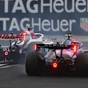 SHANGHAI, CHINA - MARCH 15: Esteban Ocon of France driving the (31) Haas F1 VF-26 Ferrari and Franco Colapinto of Argentina driving the (43) Alpine F1 A526 Mercedes make contact during the F1 Grand Prix of China at Shanghai International Circuit on March 15, 2026 in Shanghai, China. (Photo by Rudy Carezzevoli/Getty Images)