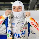 SHANGHAI, CHINA - MARCH 13: Liam Lawson of New Zealand and Visa Cash App Racing Bulls prepares to drive in the garage  during practice ahead of the F1 Grand Prix of China at Shanghai International Circuit on March 13, 2026 in Shanghai, China. (Photo by Rudy Carezzevoli/Getty Images)