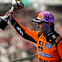 SUZUKA, JAPAN - MARCH 29: Second placed Oscar Piastri of Australia and McLaren lifts his trophy on the podium during the F1 Grand Prix of Japan at Suzuka Circuit on March 29, 2026 in Suzuka, Japan. (Photo by Mario Renzi - Formula 1/Formula 1 via Getty Images)