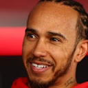 SUZUKA, JAPAN - MARCH 27: Lewis Hamilton of Great Britain and Scuderia Ferrari is interviewed