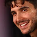 SUZUKA, JAPAN - MARCH 26: Esteban Ocon of France and Haas F1 talks to the media during previews